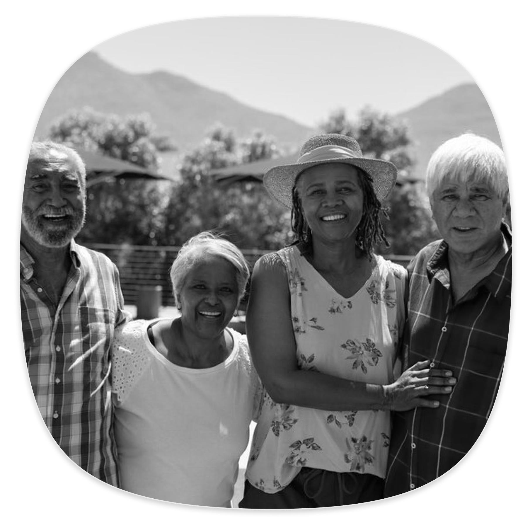 A group of elderly friends together outdoors