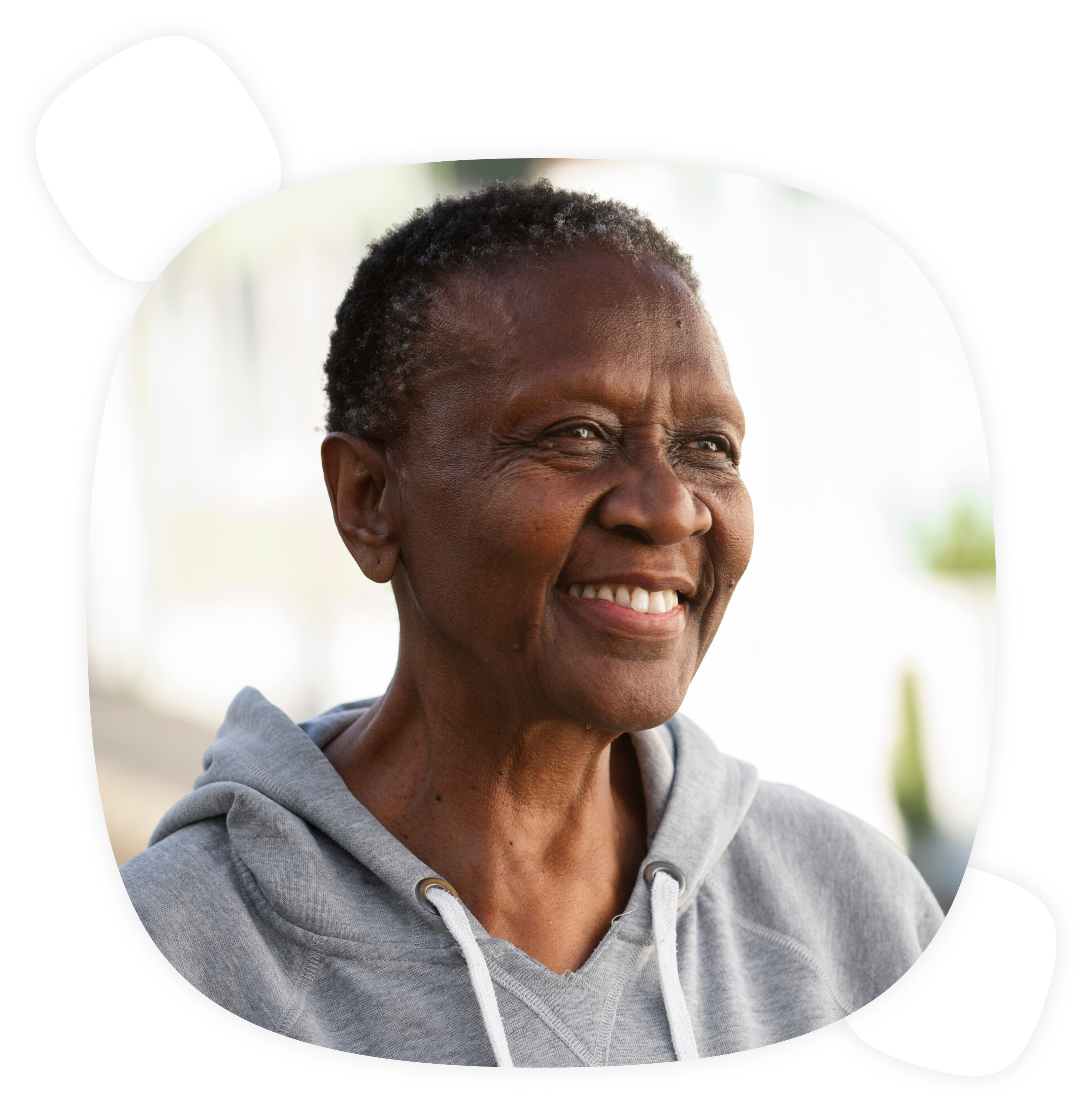 An elderly woman smiling